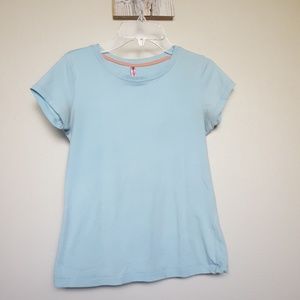 Baby blue t-shirt.